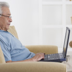Senior Man Using Laptop
